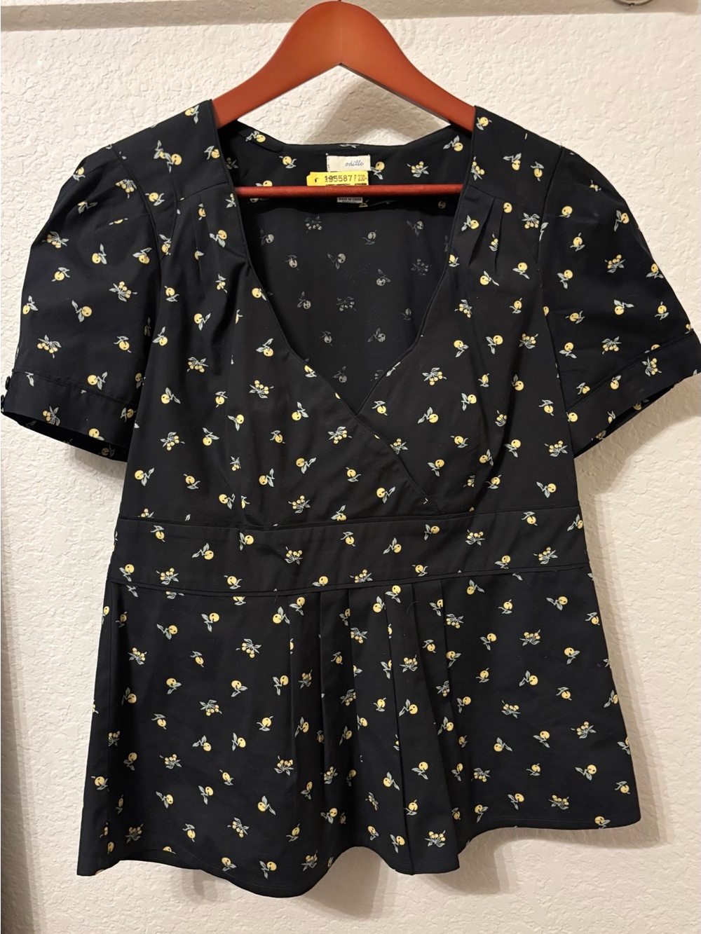 Vintage Anthropologie Odille Lemon
Print Surplice Peplum Top Black